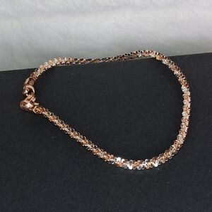 925/Rose Gold Plated Two Tone Rock Cut Twist Bravelet 7"